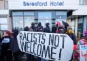 Anti-fascists from Cornwall Resists, stand outside the Beresford Hotel in Newquay, Cornwall, which houses refugees, with the Bishop of Hereford agreeing online comments are 'disturbing'