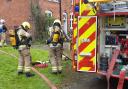 Firefighters prepare to enter a building in Brampton Bryan as part of a training exercise