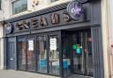 Signs have been put up at Creams Cafe in Hereford saying it's under new management