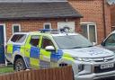 Police outside a house in Cherrybrook Close, Hope-under-Dinmore after a 35-year-old woman was found dead
