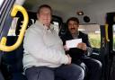 Taxi driver Mohammed Nisar and Herefordshire motor trader, Adrian Quinn, who are now friends for life. Photo: CATERS NEWS.