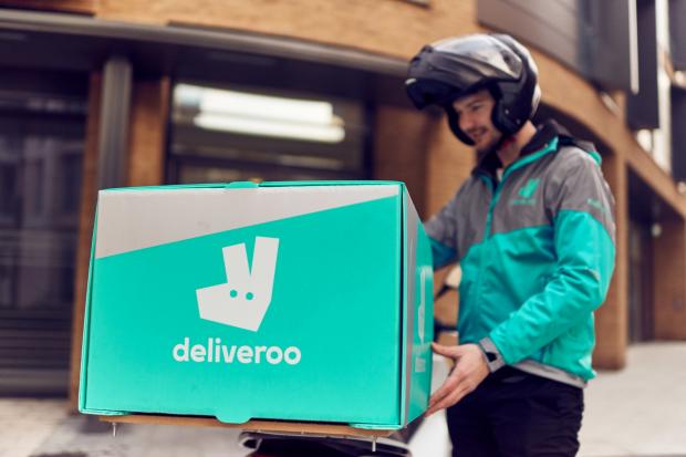 Hereford Times: You can get 15 percent off selected order on Deliveroo (PA)