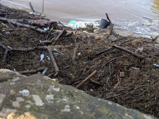 Hereford Times: Washed up debris on the river banks of the Wye Picture: Claire Smith