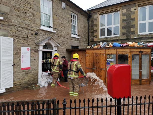 Hereford Times: Fire service pumping out flood water in Ewyas Harold