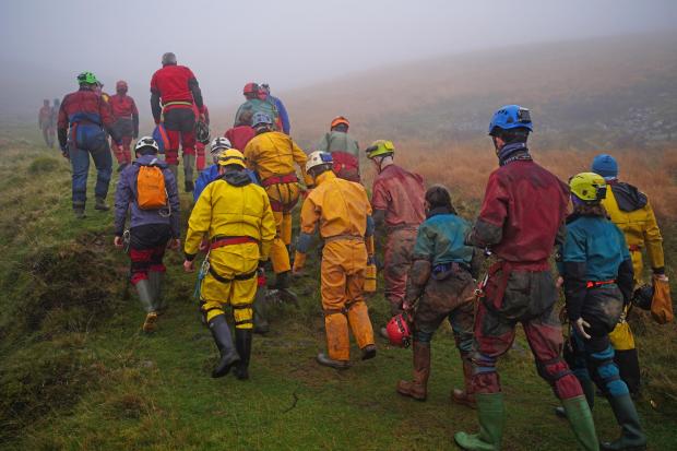 Hereford Times: Rescuers at the Ogof Ffynnon Ddu cave system near Penwyllt, west of Brecon. Picture: Ben Birchall/PA Wire 