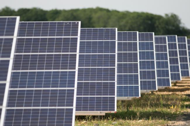 The planned solar farm would cover the same area as 60 football pitches.