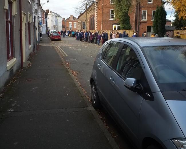 Patients form a queue outside a 'Grab a Jab' event in Leominster