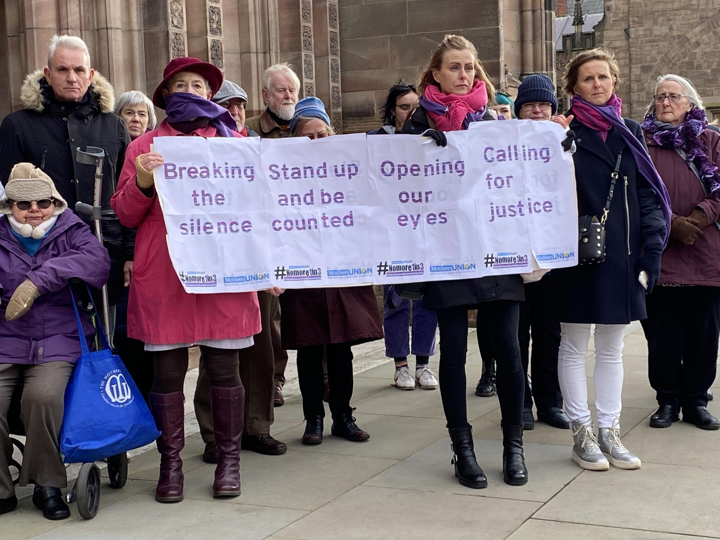 Three-minute silence outside Hereford Cathedral for Mothers Union #nomore1in3 campaign