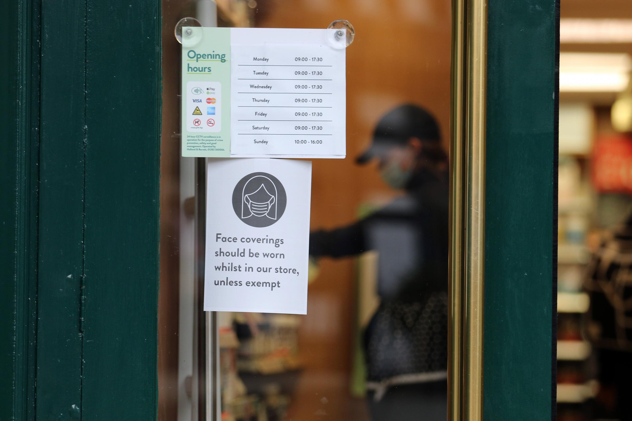 Signs have appeared in shop windows around Hereford following the government restrictions on wearing face masks in shops.