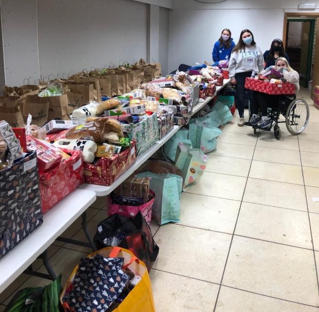 Hereford Times: Volunteers at the Living Room, Hereford, with some food parcels ready for distribution to families in need over Christmas