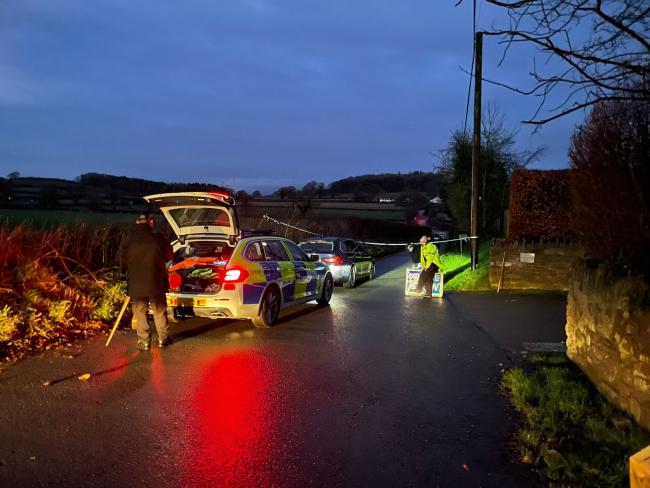 Police in Eye Lane, Moreton Eye, on Thursday after a woman was found dead in the village near Leominster.