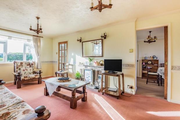 Hereford Times: A four-bed bungalow in a village on the outskirts of Hereford is for sale for the first time in 40 years. Picture: Chancellors/Zoopla