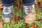 Photo via Canva/Pixabay shows a generic picture of muddy walking boots as someone goes for a walk in nature.