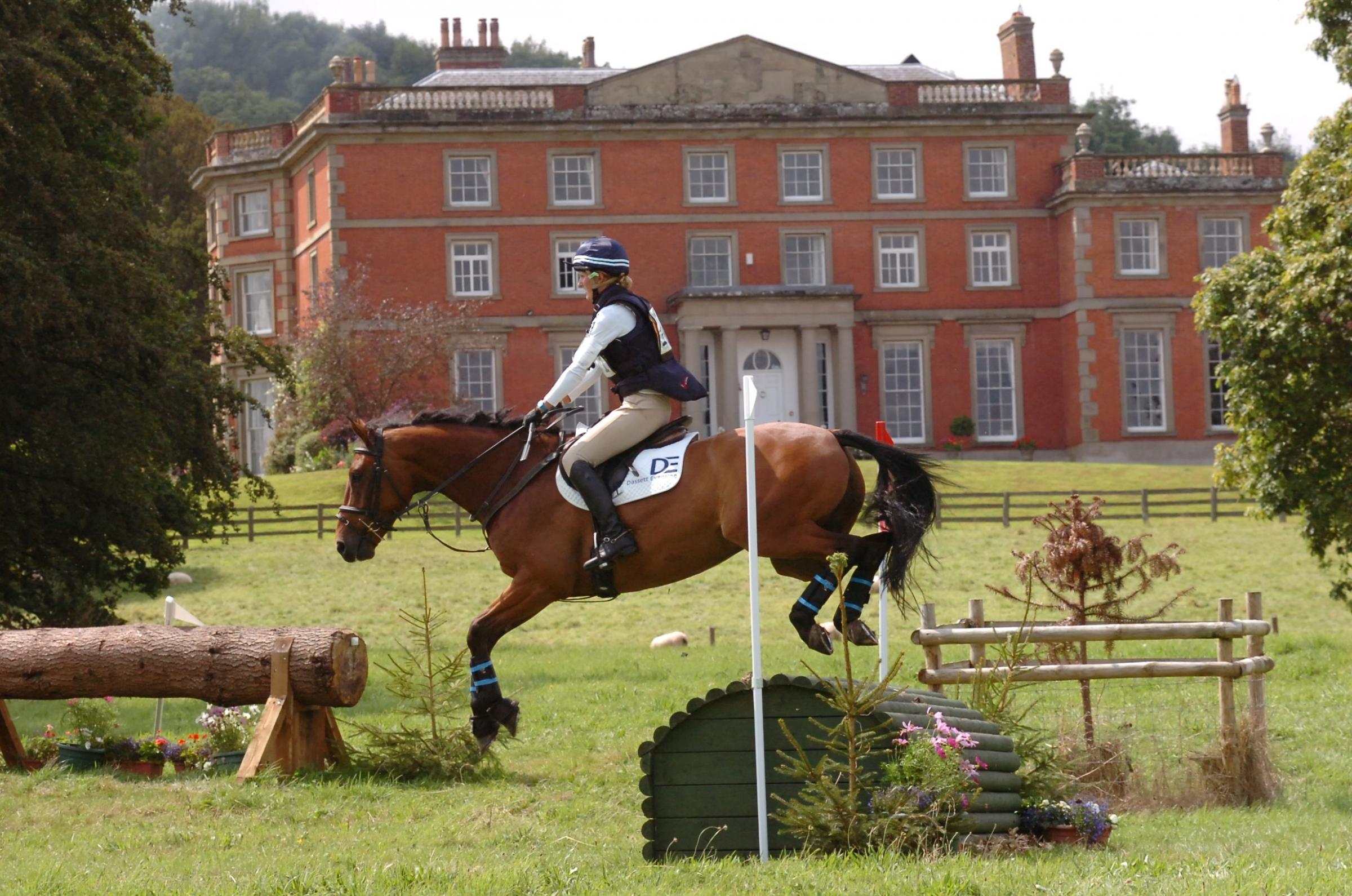 Male House Horse Trials - Rosie Thomas on Acrobat III jumps the Logpile fence on the cross country course.  1432_5006
