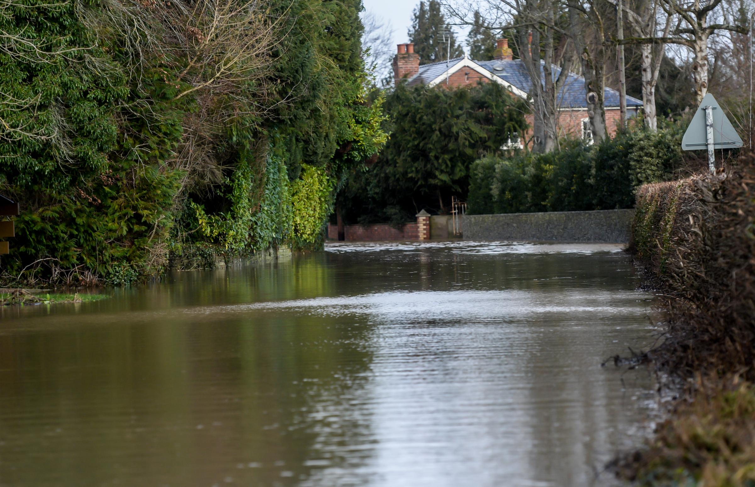 Pictured is the flooded road that cut off access to Eardisland this morning.