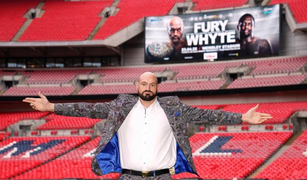 Hereford Times: Tyson Fury poses on the pitch after the press conference at Wembley Stadium, London (PA)