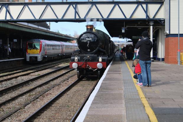 Hereford Times: Onlookers admire the steam loco Clun Castle on the platform at Hereford railway station. Picture: Karen Price