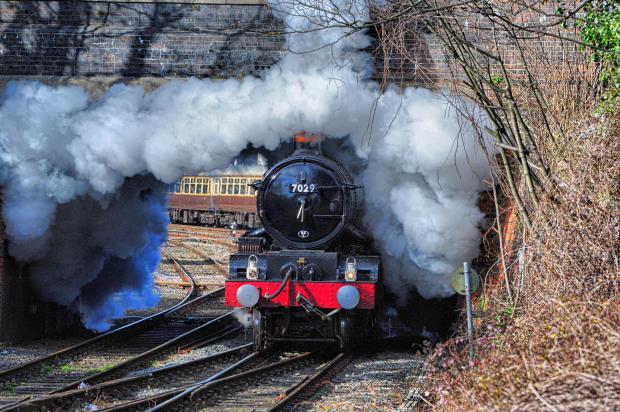 Hereford Times: The classic loco Clun Castle steams out of Hereford station. Picture: Malcolm Hince