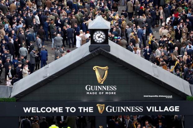 Hereford Times: The Guinness Village is always a popular hang-out at the Cheltenham Festival.(Tim Goode/PA)