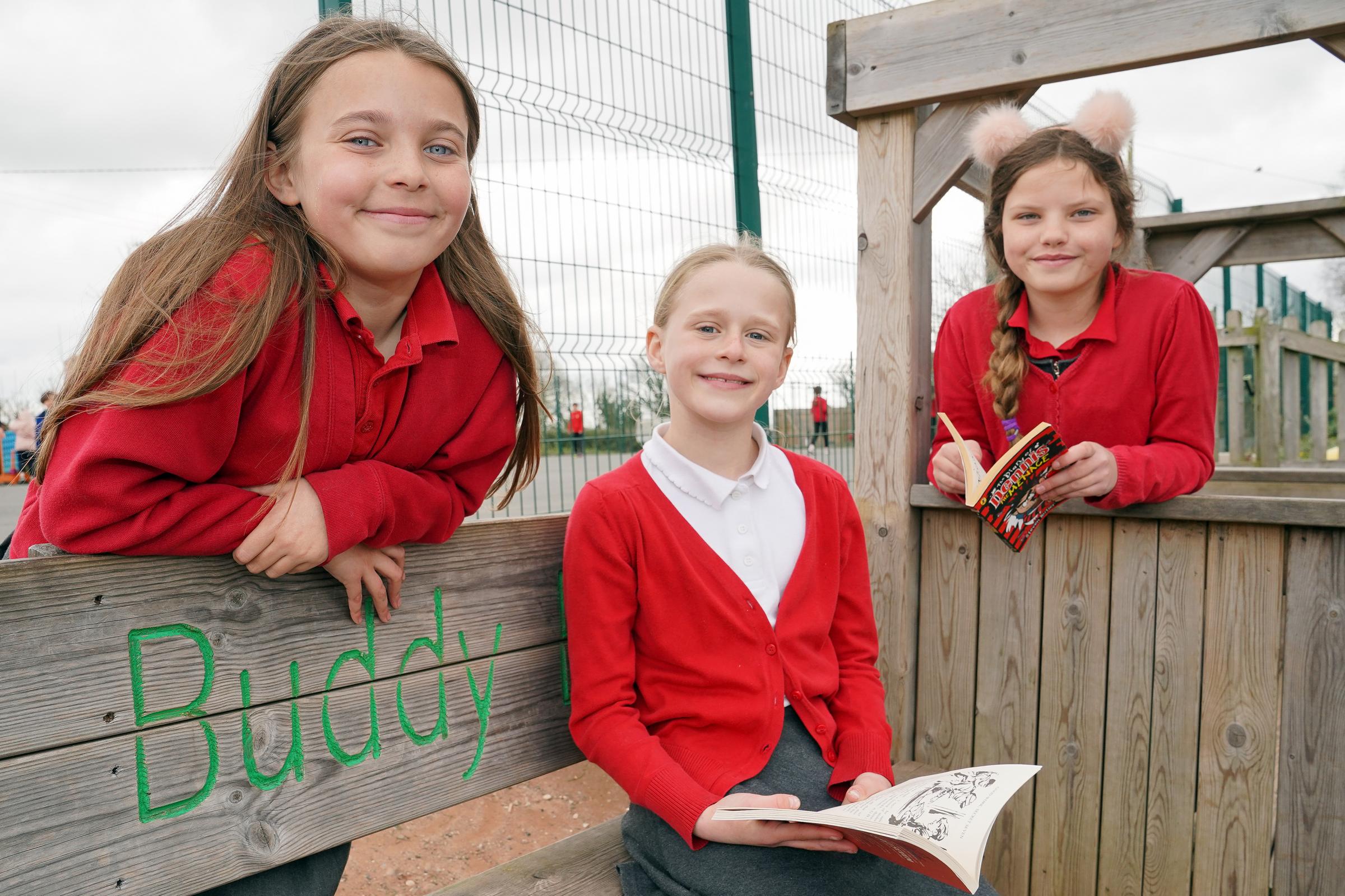 Lily Walmsley, Amaya Brain and Isabella Stanton-Davies from year 5 at the Buddy Bench area at Much Birch Primary School. Pictures: Rob Davies