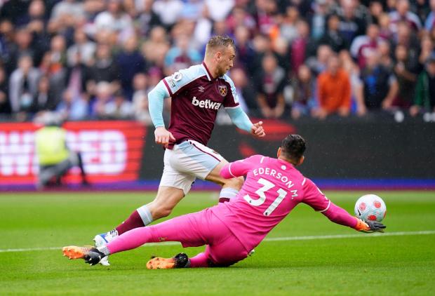 Hereford Times: West Ham United's Jarrod Bowen gets past Manchester City goalkeeper Ederson to score his side's first goal of the game during the Premier League match at London Stadium, London. Picture date: Sunday May 15, 2022. PA Photo. See PA story SOCCER