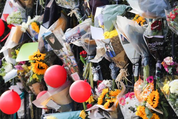Hereford Times: Floral tributes left outside Bishops Castle Rugby Club on Brampton Road..