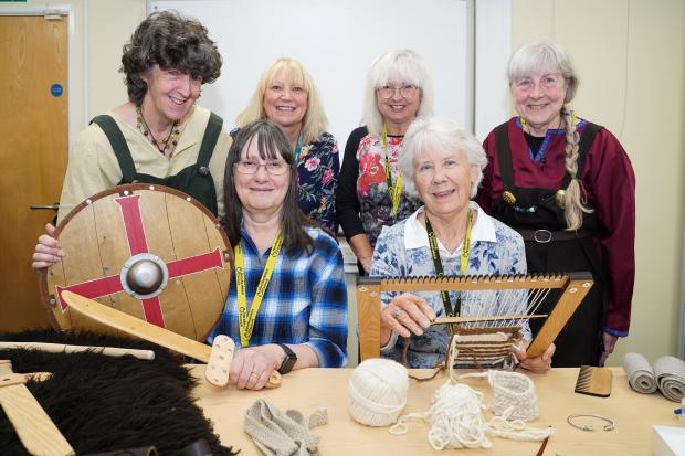 Hereford Times: Staff and volunteers of the Herefordshire Hoard exhibition at the Hereford Museum Resource and Learning Centre with Viking hands-on items. Pictured here from left, back row, Carolyn Olney, Julianne Jenkins, Hayley Edwards and Laura Sommerville. Front row, Hazel Maidman and Carolyn Mace