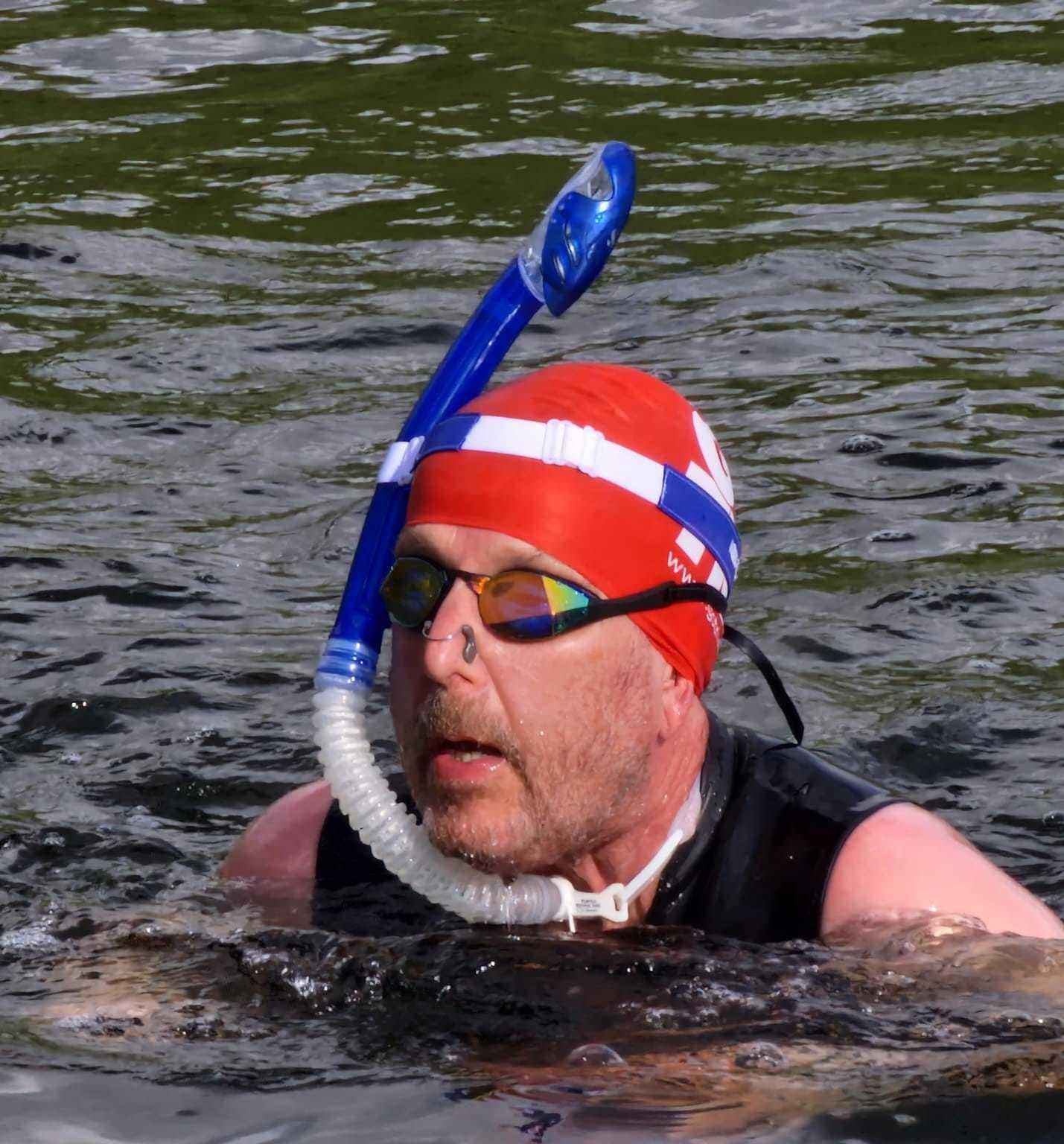Richard Andrews open water swimming with his specially fitted snorkel