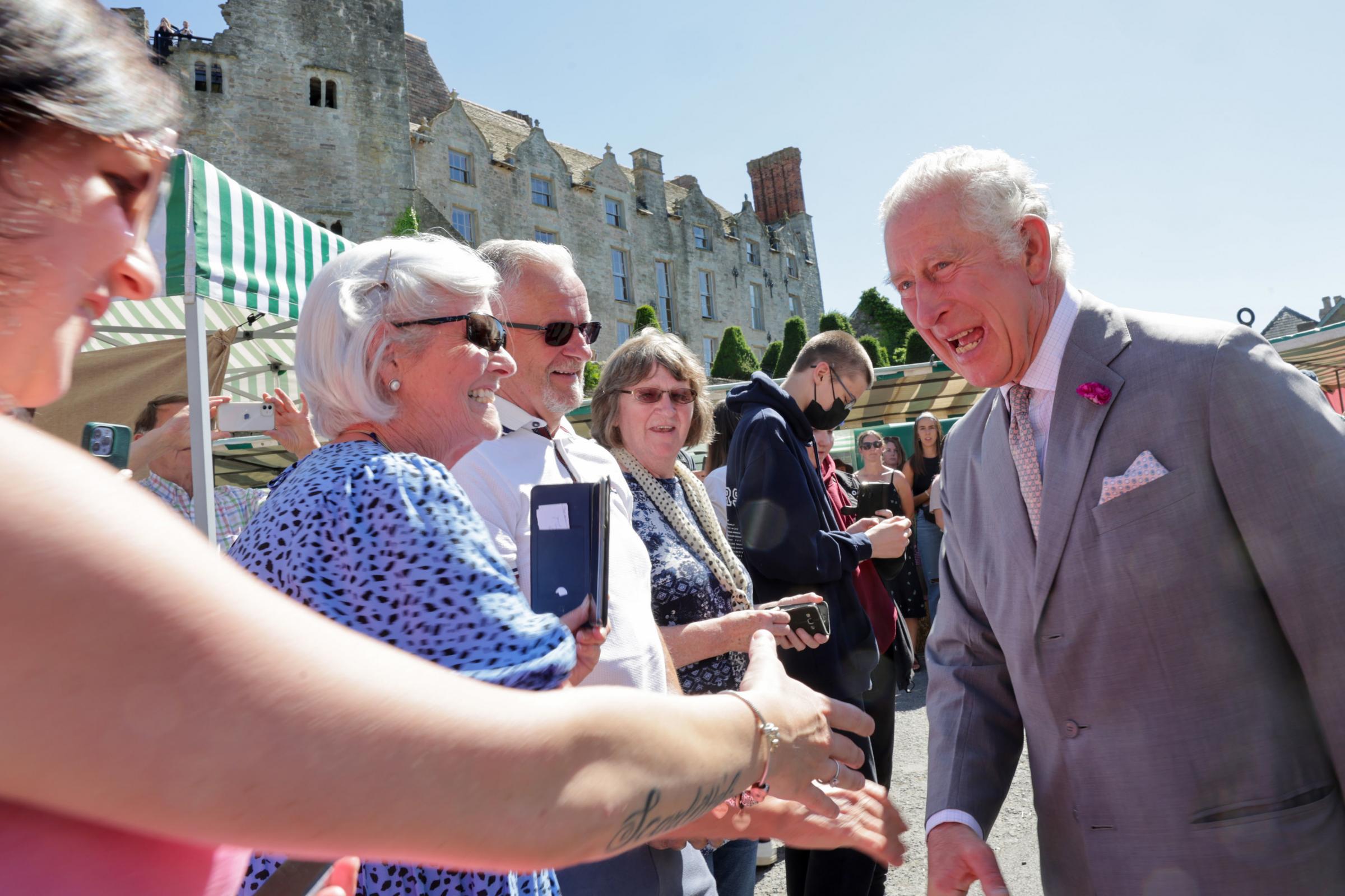 The Prince of Wales meets with members of the public during a visit to Hay Castle in Hay-on-Wye. Picture: Chris Jackson/PA Wire.