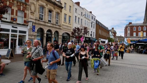 Hereford Times: Protest arrives in High Town. Picture: Rick Goldsmith