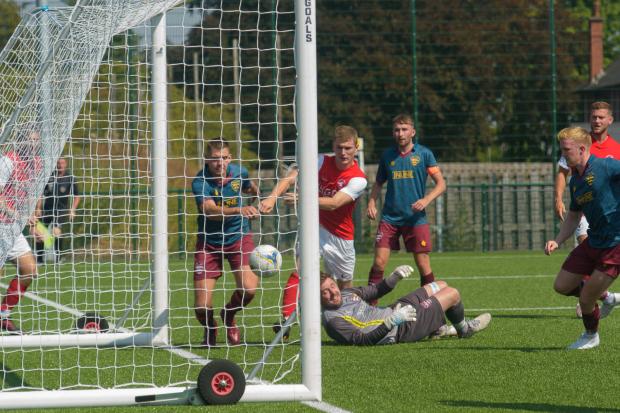 Goal scorer Cawley Cox sees a second effort saved from a tight angle. Picture: Will Cheshire