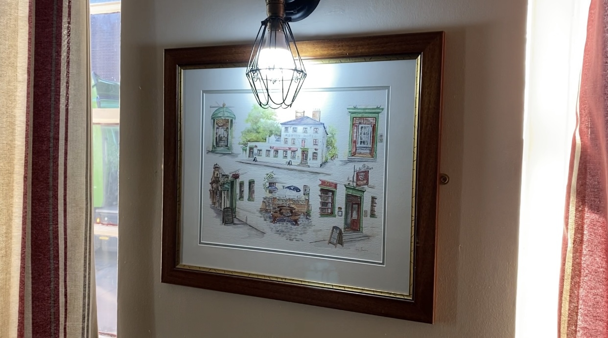 Framed drawing of the Merton Hotel