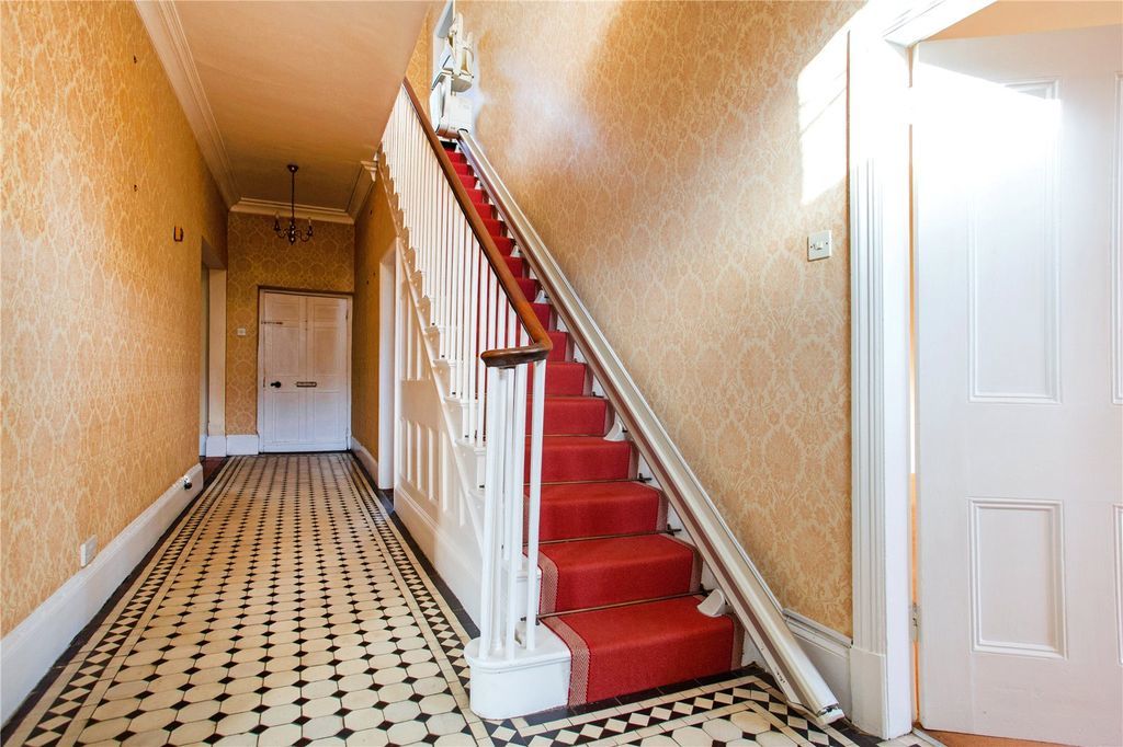 There are five bedrooms in the main house and a separate two-bed cottage. Picture: Savills/Zoopla