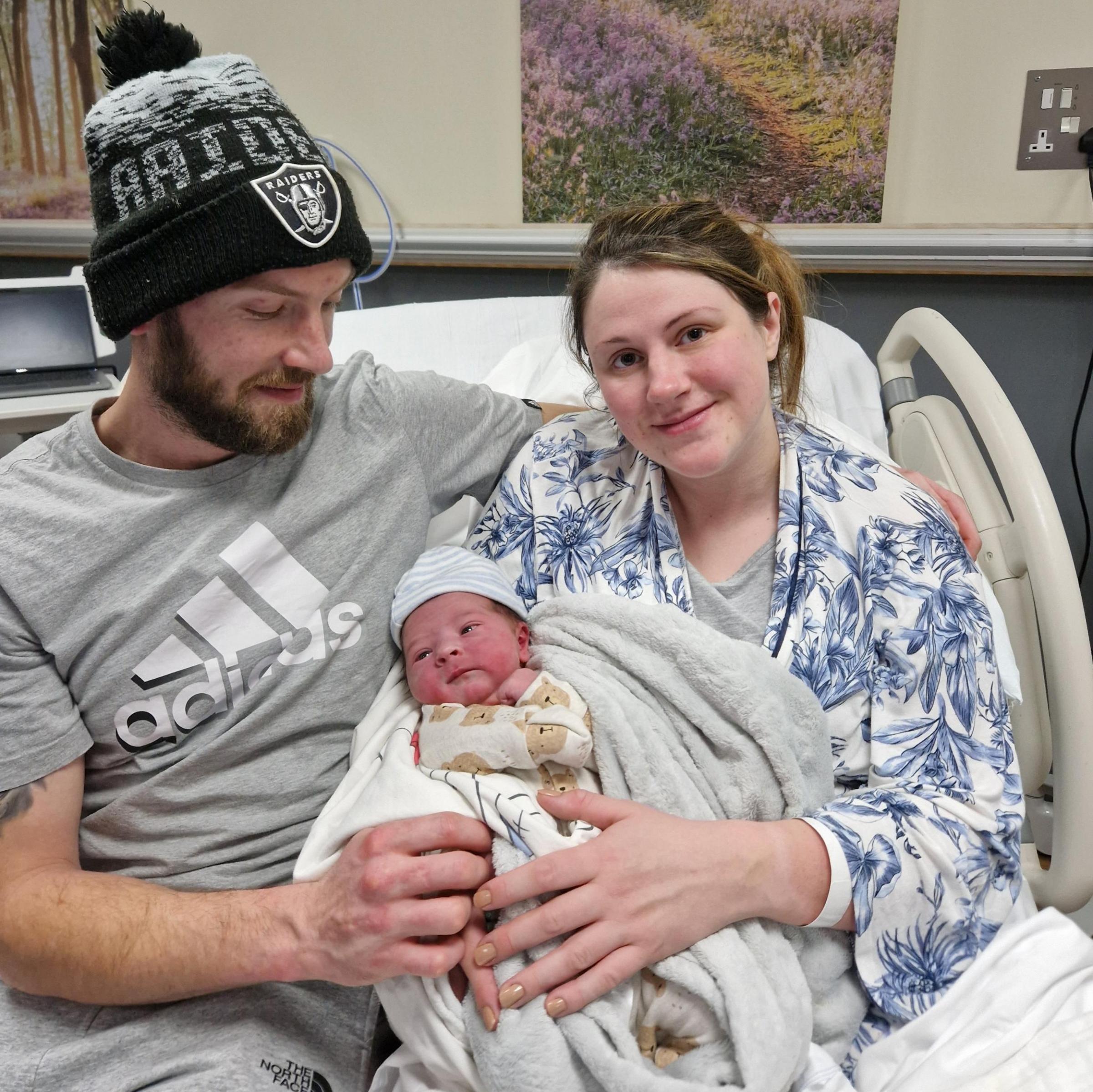 Babies born on New Years Day 2023 at Hereford County Hospital: Logan, pictured with mum Alice Crowther and dad Quaide Bundy, was born at 10.07am