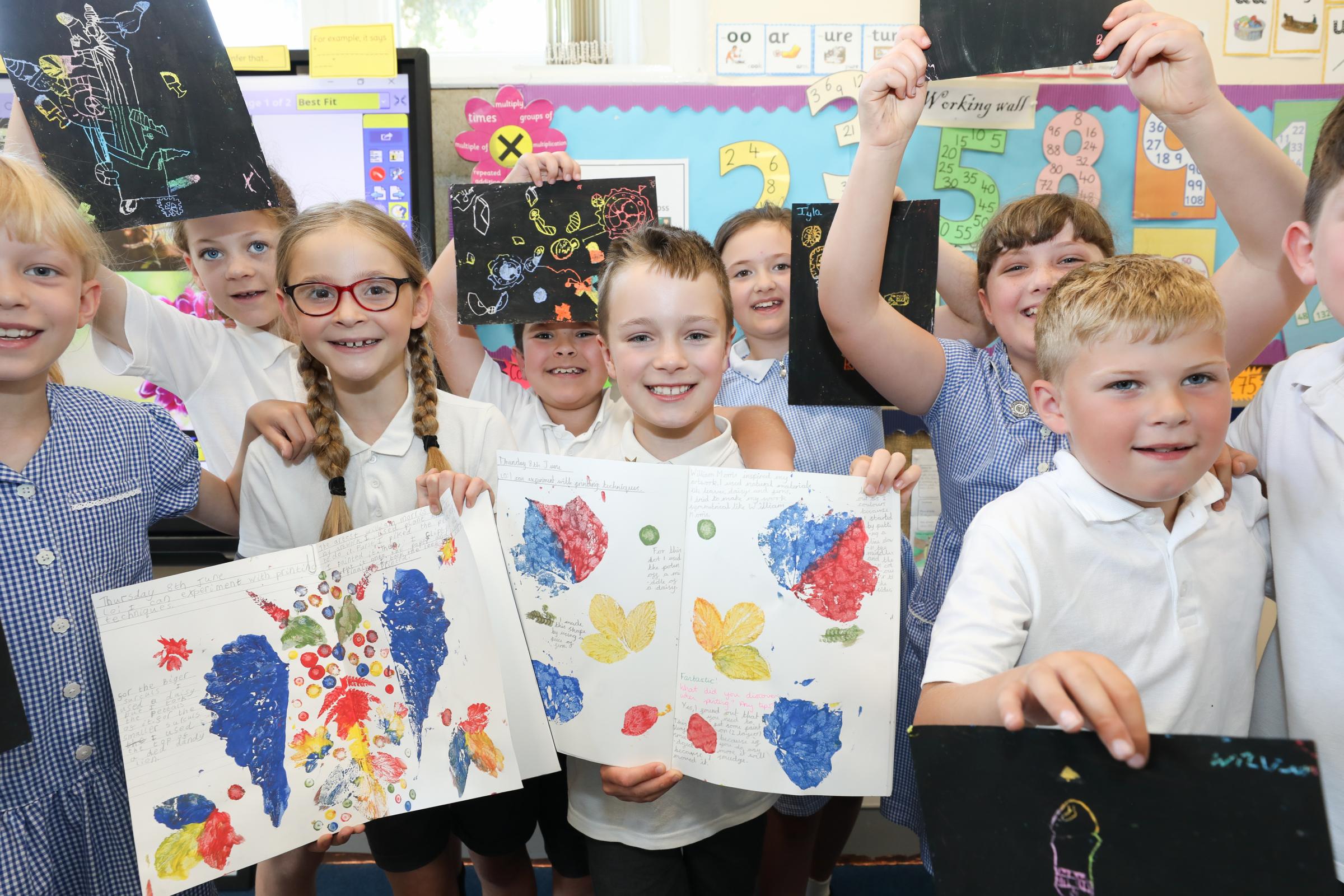 Pupils from Willow class show their printing techniques and scratch artwork.