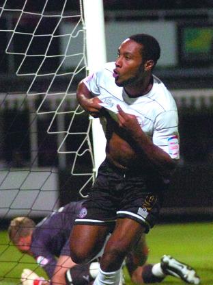 Yoann Arquin turns away to begin his celebration after scoring the only goal in Hereford United’s Carling Cup first-round success against Brentford at Edgar Street on Tuesday. 113207-2 Picture by JAMES MAGGS