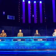Rosh Gungabissoon sits on the fair left on the Chase with his fellow contestants