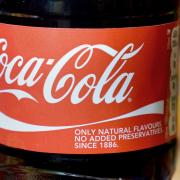 The Coca-Cola Company has announced it will suspend all business in Russia, after calls for it to stop selling its products in the country (PA)