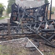A road will be closed for eight days as a fire left a barn unstable and at risk of collapse. Picture: Jo Prior