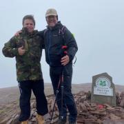 David Perkins and Ken Hames MBE at the summit of Pen y Fan in the Brecon Beacons.