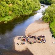 A drone image of the protest by 130 citizen scientists by the river Wye. Picture: Aerial Photography Wales