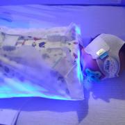 Wye Valley NHS Trus said Otis looked like a glow worm wrapped up in his Bili-cocoon