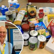 Donated food, and Coun Kevin Tillett promoting St Martin's Church FoodShare