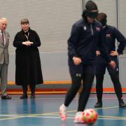King Charles watching a demonstration of blind football at the Royal National College for the Blind in Hereford