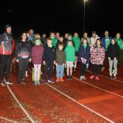 Ben Skinner, left, with runners from the Hereford & County Athletics Club at the track