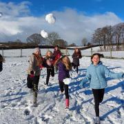 Children at Michaelchurch Escley Primary School, which has just been graded as good by Ofsted, having a snowball fight