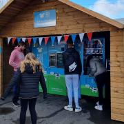 Customers using the new Whole Moo World milkshake vending machine in Weeping Cross Lane in Ludlow. Picture: Whole Moo World