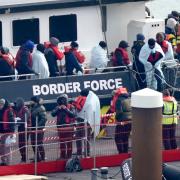 A group of people thought to be migrants are brought in to Dover, Kent, onboard a Border Force vessel