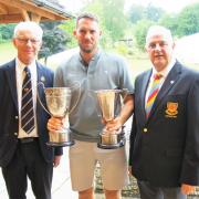 Ady Marshall being presented with the Hereford Times Bowl by Shropshire & Herefordshire County Golf president Charles Sievewright (left) and Bridgenorth captain Kelvin Jones (right)