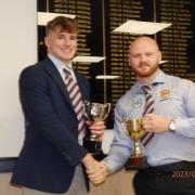 Hereford rugby players Ollie Bullied and Tom Williams with their trophies from the end of season presentation